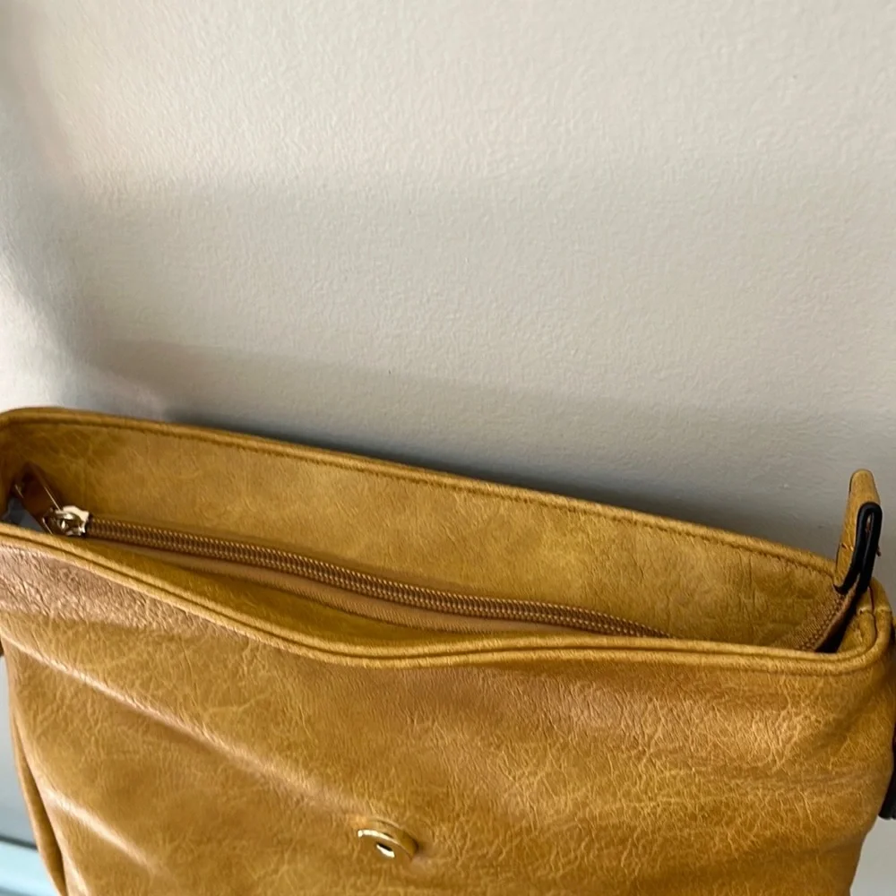 Alyssa vegan leather flap over crossbody handbag purse with tassels. NWT
